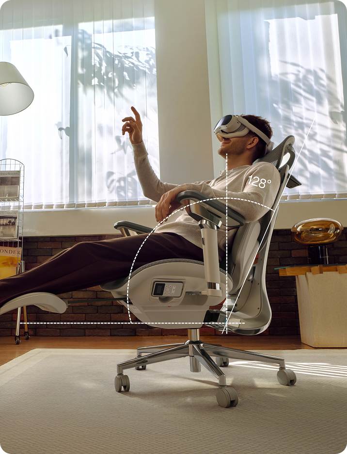 a man relexing in a Hbada x7 ergonomic chair in a modern office setting