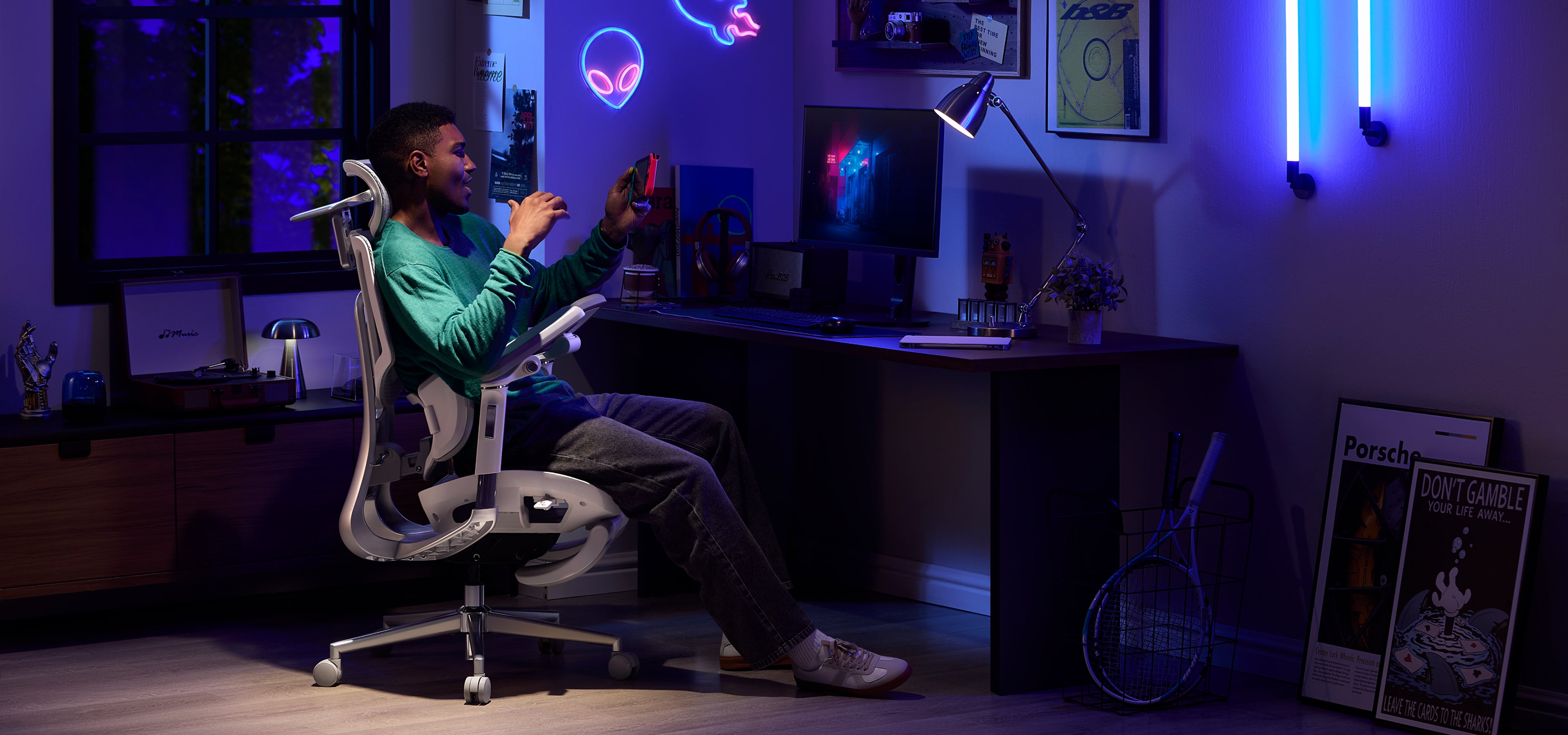 Person happily sitting in a HBADA gaming chair ergonomic